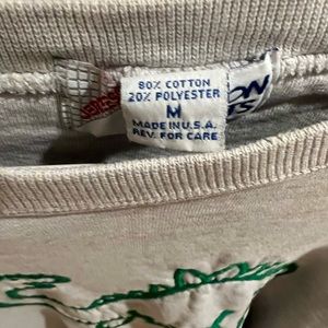 Embroidered dinosaur sweatshirt